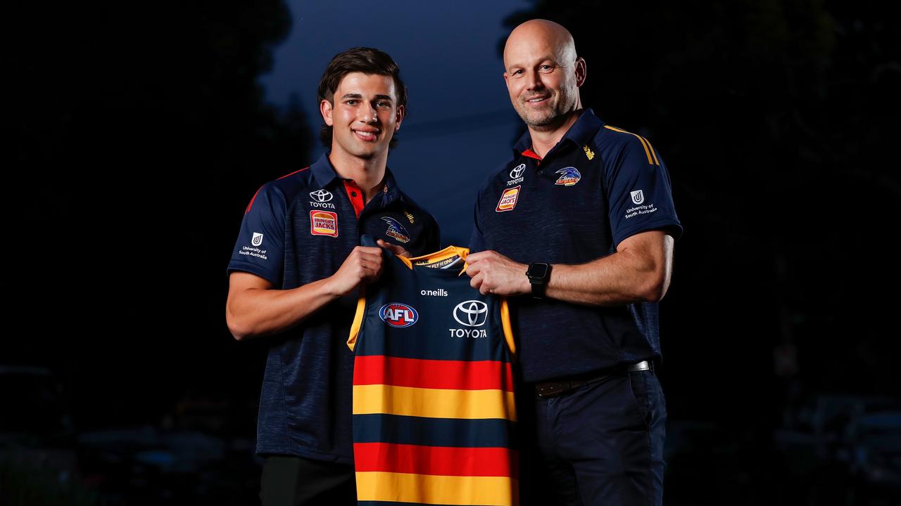 Crows coach Matthew Nicks presenting Josh Rachele with his guernsey on draft night. Picture: Michael Willson/AFL Photos via Getty Images