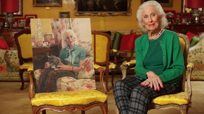 Philanthropist Lady Primrose Potter with the portrait of her that has been commissioned by the National Portrait Gallery. Picture: David Caird