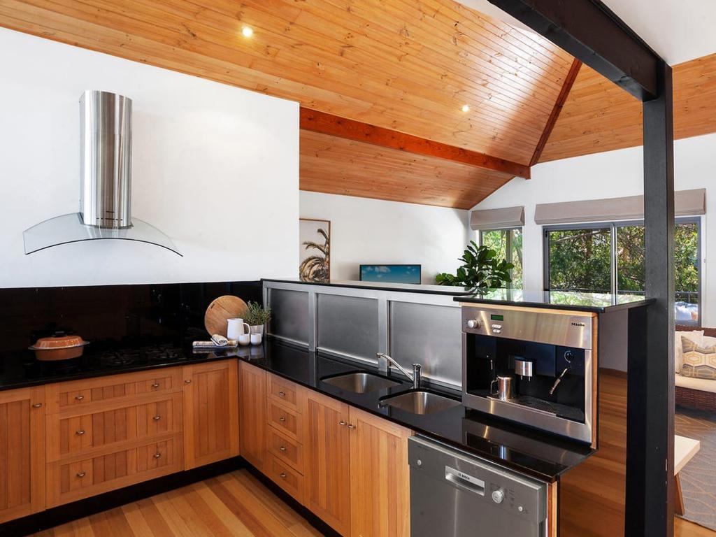 Timber lined cathedral ceilings.