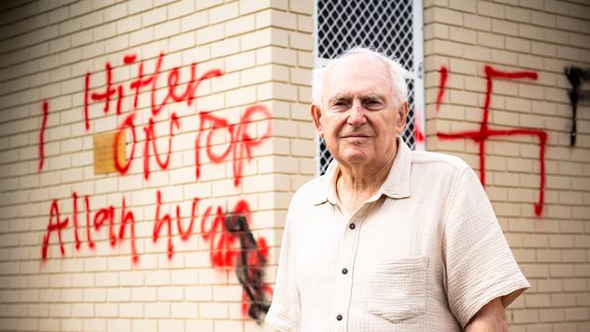 Southern Sydney Synagogue president George Foster stands in front of the vandalised synagogue. Picture: Tom Parrish