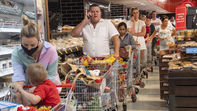 Shoppers rush for last minute groceries before Cairns’ lockdown was due to start yesterday. Picture: Brian Cassey