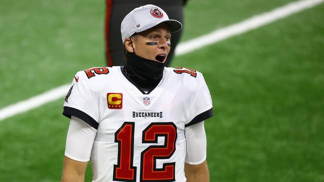 DETROIT, MICHIGAN - DECEMBER 26: Tom Brady #12 of the Tampa Bay Buccaneers reacts during the third quarter of a game against the Detroit Lions at Ford Field on December 26, 2020 in Detroit, Michigan. Rey Del Rio/Getty Images/AFP == FOR NEWSPAPERS, INTERNET, TELCOS &amp; TELEVISION USE ONLY ==