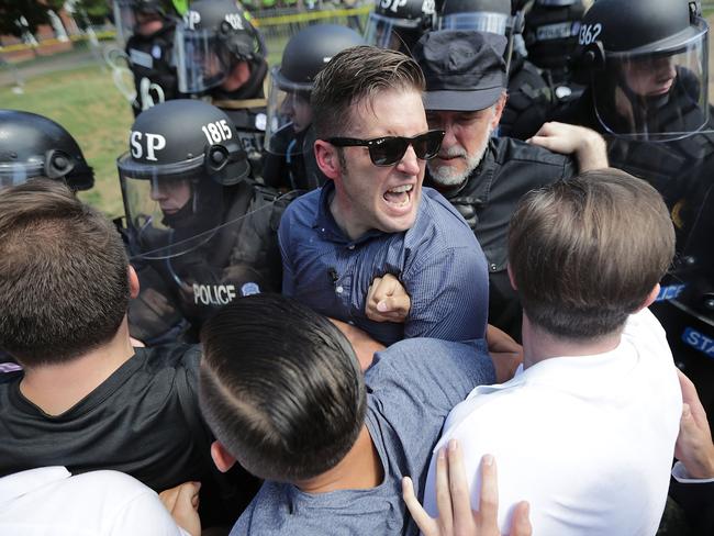 White nationalist Richard Spencer and his supporters clash with Virginia State Police in Lee Park after the ‘Unite the Right’ rally was declared an unlawful gathering in Charlottesville, Virginia. Picture: Chip Somodevilla/Getty Images/AFP