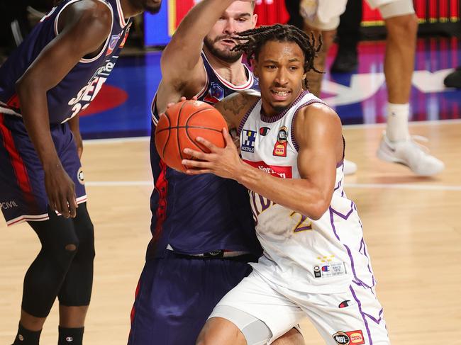 Jaylen Adams of the Kings and Issac Humphries of the 36ers during the round four NBL match between Adelaide and Sydney at Adelaide Entertainment Centre. Photo: Sarah Reed/Getty Images.