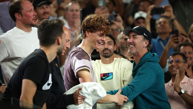 Jannik Sinner celebrates with Darren Cahill (right) after winning the Australian Open. (Photo by Daniel Pockett/Getty Images)