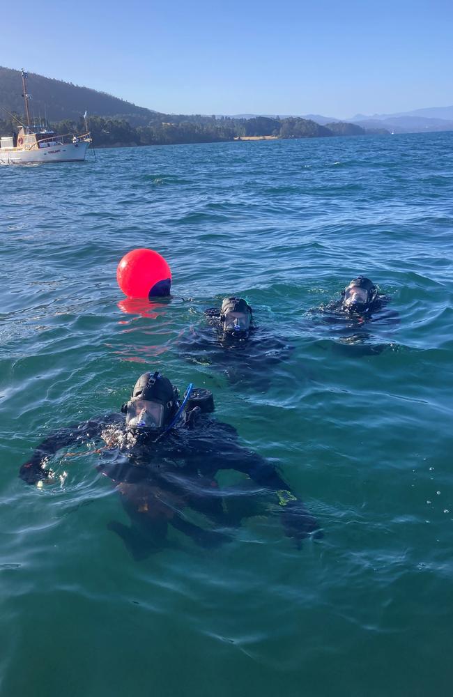 Police Vessel Vigilant with Police Divers over sunk vessel – MV Goondooloo. Picture: Tasmania Police