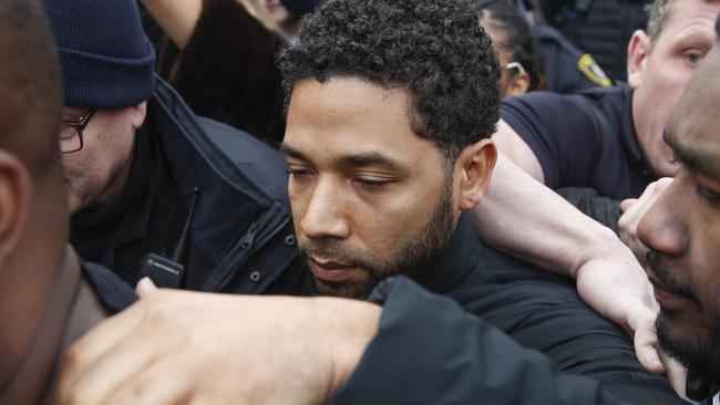 Jussie Smollett leaves court in Chicago. A lawyer for Smollett is asking a judge to allow the "Empire" actor to travel while he is free on bond on charges he falsely reported being attacked by two masked men. Picture: AP