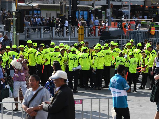 Security guards in Melbourne ahead of New Year's Eve celebrations. Picture: AAP/James Ross