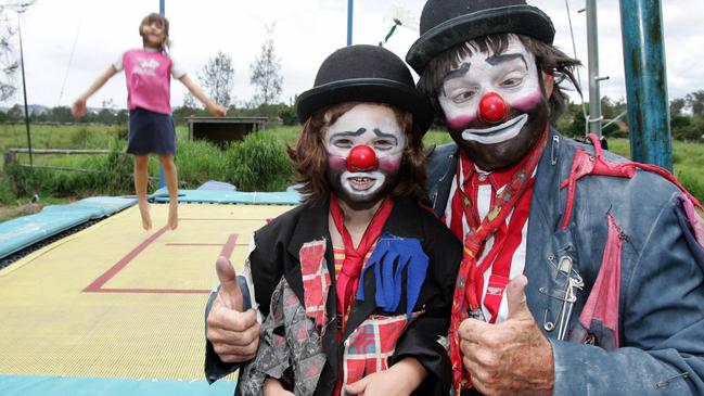 Archie the clown played by Robert Bruce and Iggy played by Igors Matvejs and Raelene Stevens at Merrimac in 2005. Picture: Ann Hovey.