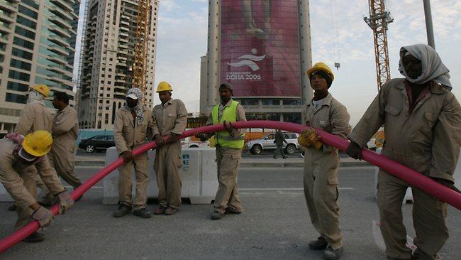 Campaigners have called on Qatar to change its policy towards migrant labourers, such as those seen here in Doha in 2006, preparing for the 2022 World Cup labelling it "modern day slavery"