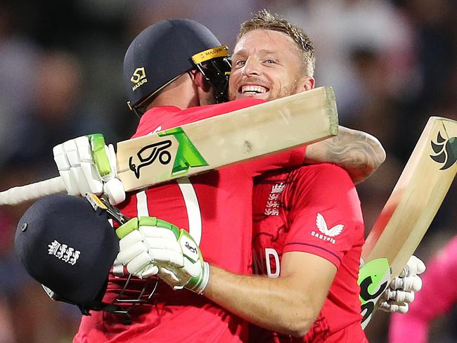 ADELAIDE, AUSTRALIA - NOVEMBER 10:  Alex Hales of England and  Jos Buttler of England embrace as England wins the match during the ICC Men's T20 World Cup Semi Final match between India and England at Adelaide Oval on November 10, 2022 in Adelaide, Australia. (Photo by Sarah Reed/Getty Images)