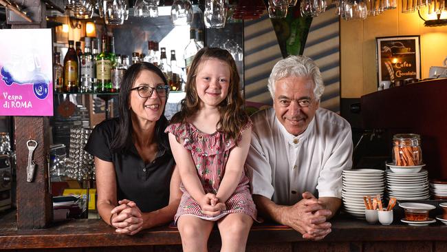 Franco and Luciana Graniero and their granddaughter Alexiaat their restaurant on Parramatta Rd. Picture: Flavio Brancaleone