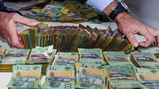 $1.8 million cash seized during Operation Ironside South Australian arrests. Picture: Brenton Edwards