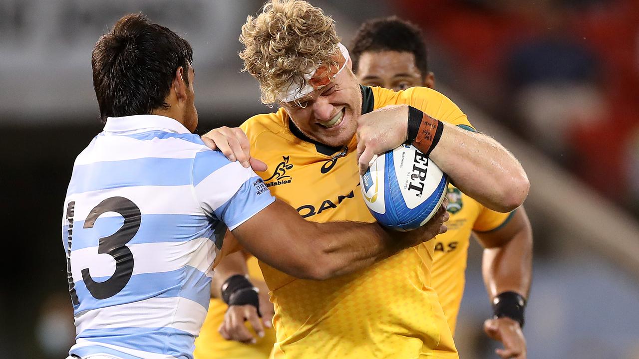 Wallabies lock Matt Philip is tackled by an Argentinian opponent. Picture: Getty Images