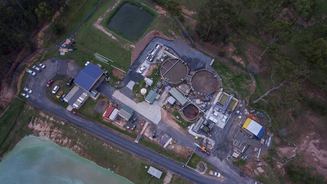 Logan council’s water treatment plant at Flagstone where two large old technology aerated tanks sit next to sleek, smaller rectangle filtration tanks which use new technology.