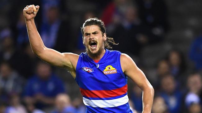 MELBOURNE, AUSTRALIA - JUNE 23:  Tom Boyd of the Bulldogs celebrates kicking a goal during the round 14 AFL match between the Western Bulldogs and the North Melbourne Kangaroos at Etihad Stadium on June 23, 2018 in Melbourne, Australia.  (Photo by Quinn Rooney/Getty Images)