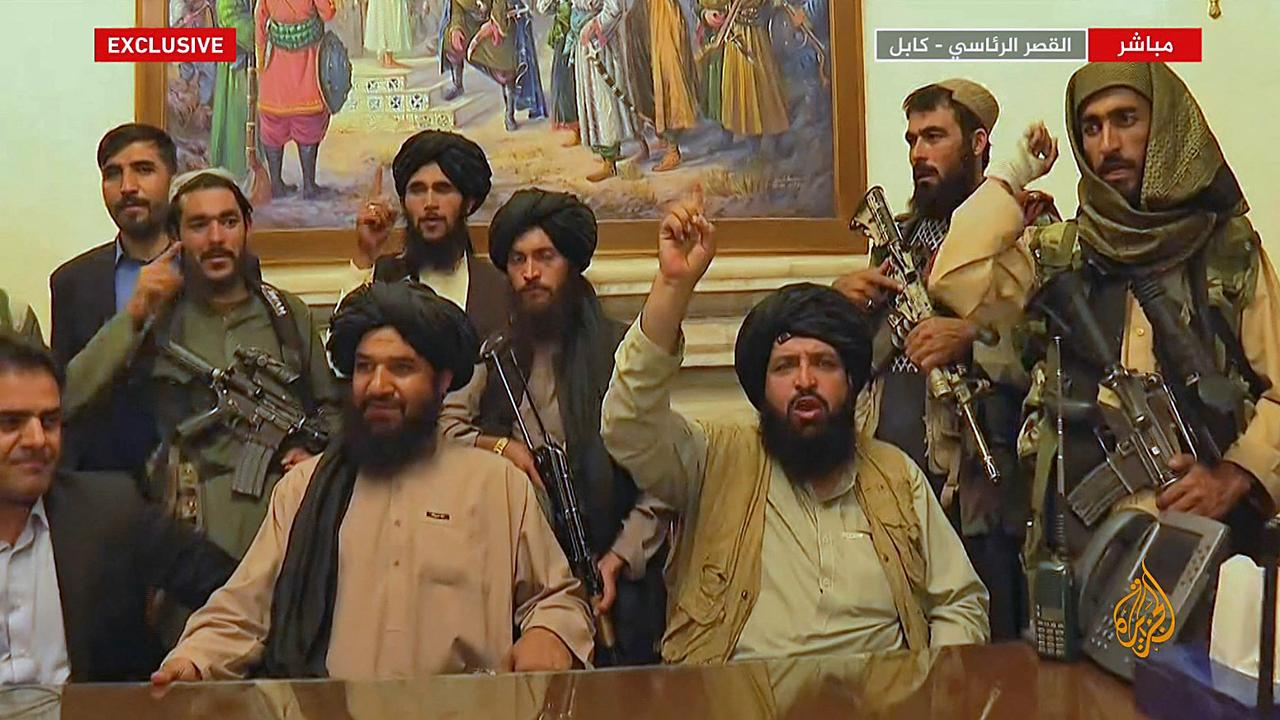 Members of the Taliban take control of the presidential palace in Kabul after Afghanistan's president flew out of the country. Picture: Al Jazeera/ AFP