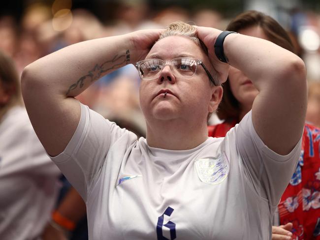 An England fan reacts. Picture: HENRY NICHOLLS / AFP.