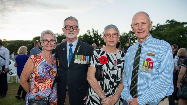 Kylie Simmons, Ray Martin, Debbie Perkins and Scott Perkins as Territorians gather in Darwin City to reflect on Anzac Day. Picture: Pema Tamang Pakhrin