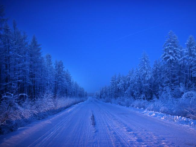 A view of Stalin’s “Road of Bones”, the route to Oymyakon, on a -50c evening Village of Oymyakon, which is considered to be the coldest permanently inhabited settlement in the world, Russia. Picture: Amos Chapple/REX/Shutterstock/Australscope