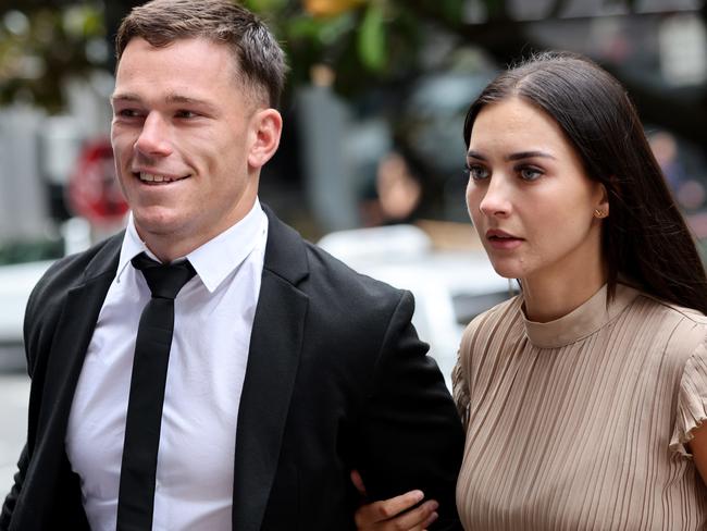 NRL player Tom Starling and his girlfriend Chelsea Balzan pictured walking into Downing Centre Court during the hearing in December 2022. Picture: Damian Shaw