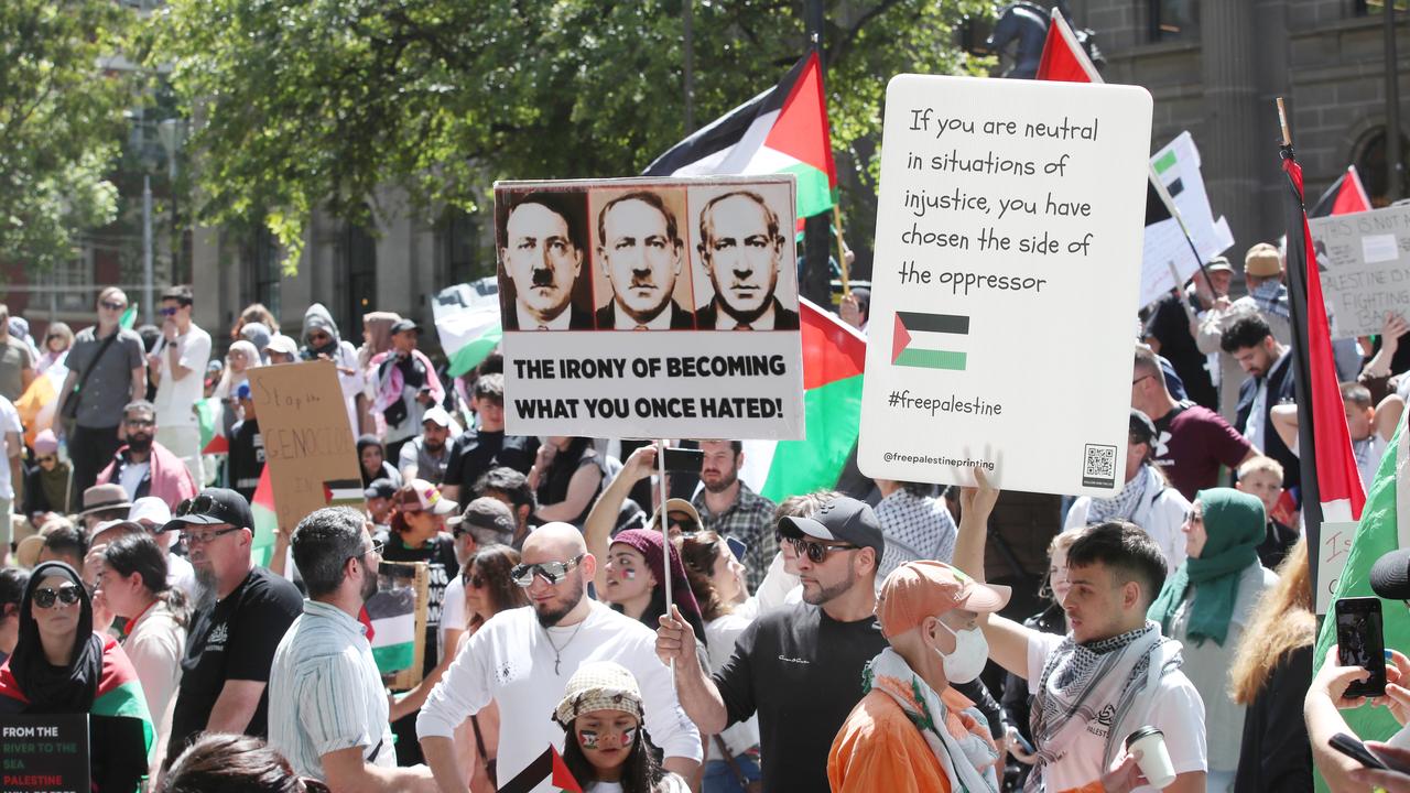 A protest sign comparing Israeli Prime Minister Benjamin Netanyahu to Hitler. Picture: David Crosling