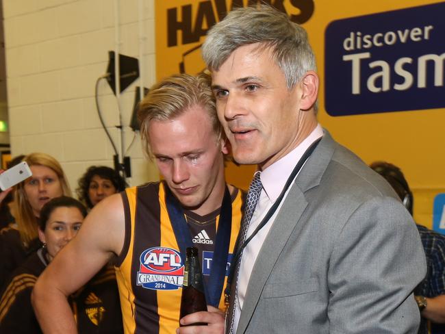 Hawthorn champion Chris Langford (right) with son Will after the 2014 grand final. Picture: Alex Coppel