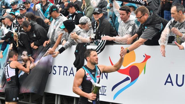 Power skipper Travis Boak, with Shanghai Cup in hand, thanks for the fans in China. Picture: AAP Image/David Mariuz