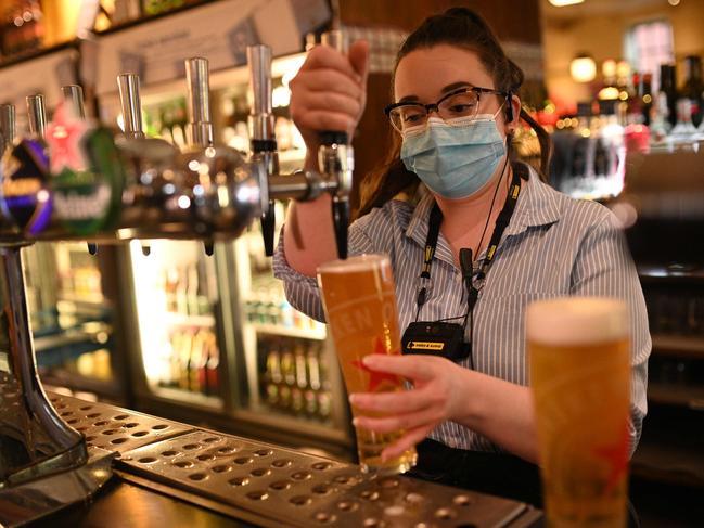 A pint is pulled in a Wetherspoons pub in Leigh, Greater Manchester, northwest England. Picture: AFP