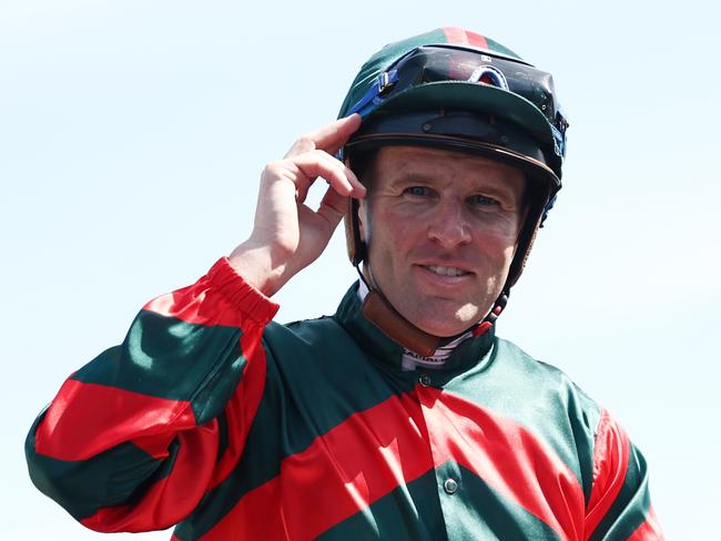 SYDNEY, AUSTRALIA - JANUARY 25: Tommy Berry riding Political Debate  win Race 5 Drinkwise during Sydney Racing at Royal Randwick Racecourse on January 25, 2025 in Sydney, Australia. (Photo by Jeremy Ng/Getty Images)