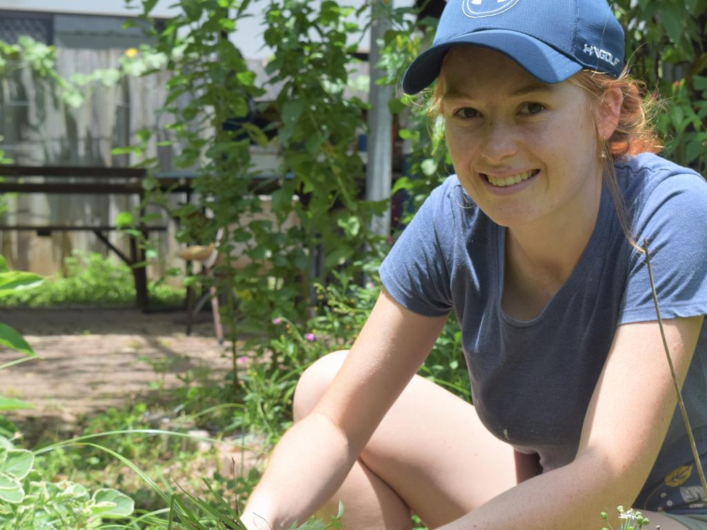 Rhiannon Jones at a working bee to finish the pizza oven at the Mackay Community Gardens. Picture: Heidi Petith