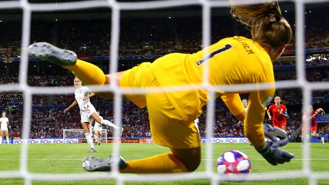 USA goalkeeper Alyssa Naeher saves a penalty attempt from England’s Steph Houghton. Picture: Getty Images
