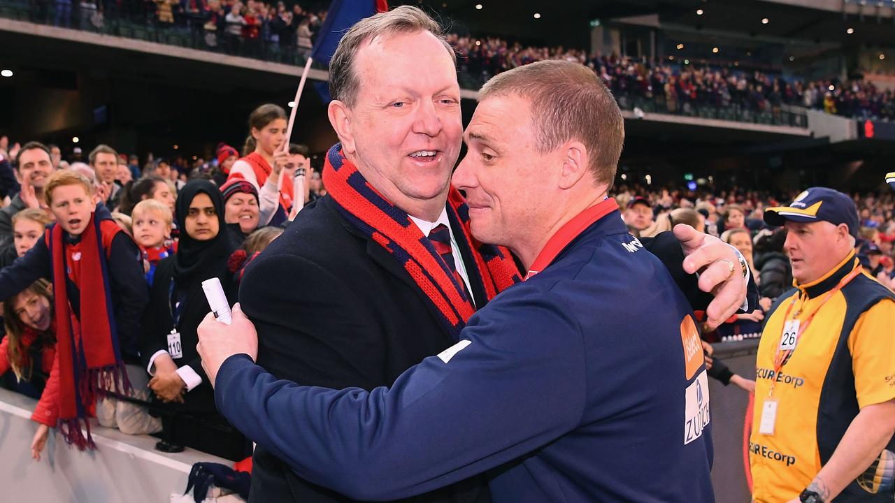 MELBOURNE, AUSTRALIA - AUGUST 26: Glen Bartlett the President hugs Simon Goodwin the coach of the Demons after winning the round 23 AFL match between the Melbourne Demons and the Greater Western Sydney Giants at Melbourne Cricket Ground on August 26, 2018 in Melbourne, Australia. (Photo by Quinn Rooney/Getty Images)