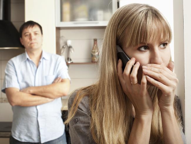 Suspicious wife on phone. Picture: istock