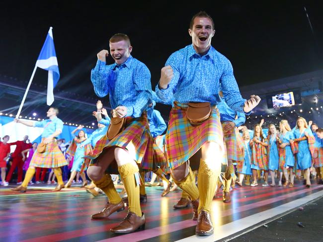 It could be worse ... athletes from Scotland cheer as they arrive during the Opening Ceremony for the Glasgow Games in 2014. Picture: Quinn Rooney/Getty Images