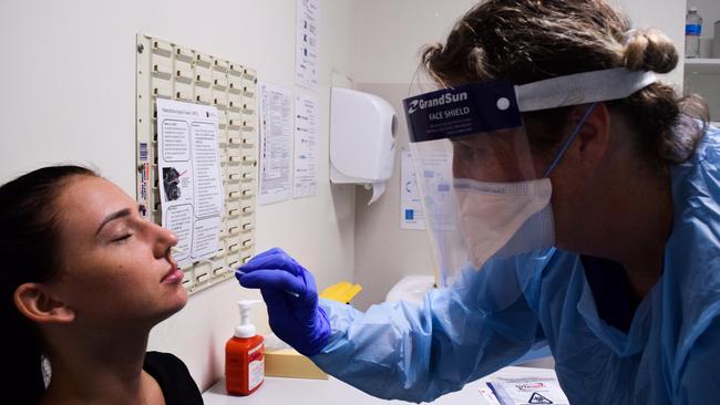 A woman being tested for coronavirus (COVID-19) at St Vincent's Hospital in Sydney. Picture: AAP