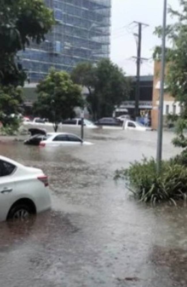 Flooding in West End after a sudden downpour this afternoon. Picture: Facebook