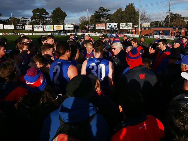 MELBOURNE, AUSTRALIA - JUNE 30:  Port Melbourne coach Gary Ayres speaks to his players during the round 13 VFL match between Port Melbourne and Sandringham at North Port Oval  on June 30, 2018 in Melbourne, Australia.  (Photo by Michael Dodge/AFL Media/Getty Images)