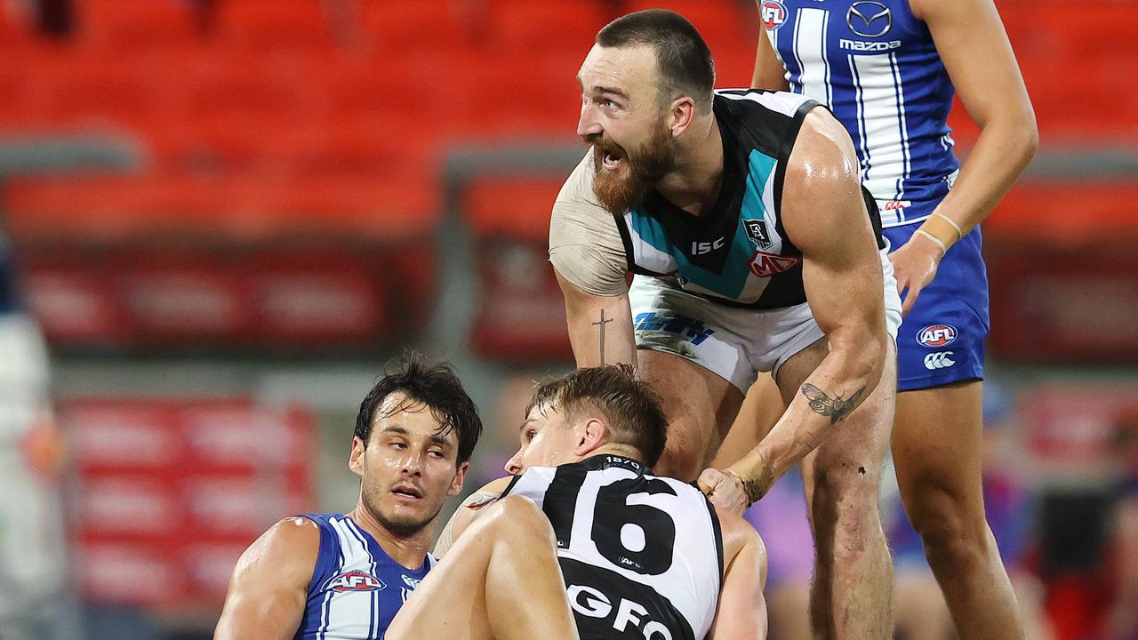 Charlie Dixon enjoyed Ollie Wines’ goal during Port Adelaide’s win over North Melbourne. Picture: Michael Klein