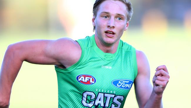 Nick Burke on the training track with Geelong.