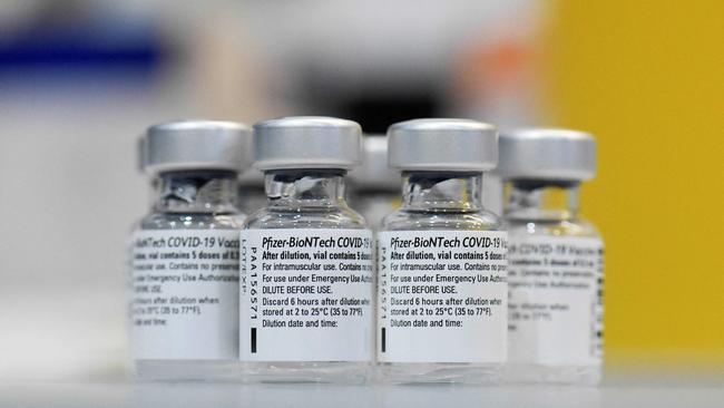 Vials of the Pfizer-BioNTech Covid-19 vaccine are displayed at the COVID-19 vaccination centre. Picture: AFP