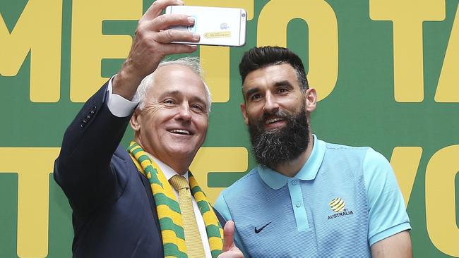 Mile Jedinak, pictured with PM Malcolm Turnbull, is part of Professional Footballers Australia’s executive, which is yet to comment on the turmoil. Picture: AP