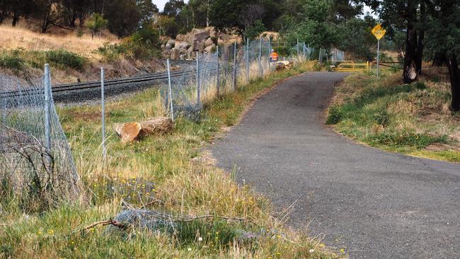 A fence has been cut on the Bell Bay Line so that trespassers can illegally access the rail corridor and dump their rubbish. Picture: SUPPLIED