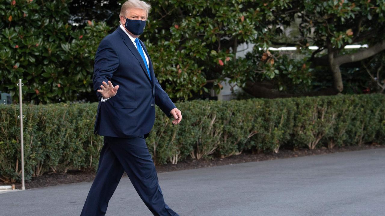 Donald Trump walking out of the White House to board Marine One. Picture: Saul Loeb/AFP