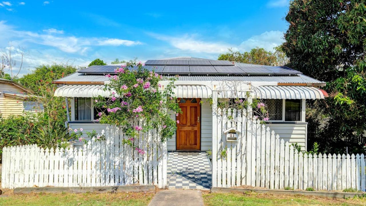 This four-bedroom house at 21 Berrie St, Gympie, is on the market for offers over $450,000.