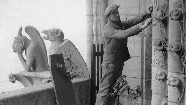 Installation works at Notre-Dame about 1900. Parisians have reams of rules about historic preservation. Picture: Imagno/Getty Images