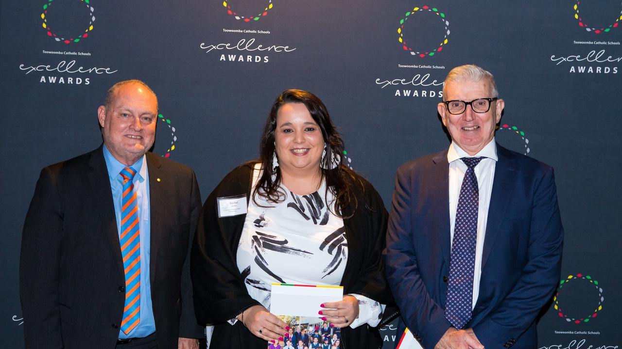 Award recipient Rachel Harlen (centre) with David Hutton and Dr Pat Coughlan.