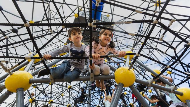 James, 4, and Olivia, 6, Azzopardi explore the double dome climbing net at the opening of Booran Reserve in 2017. Picture: Valeriu Campan