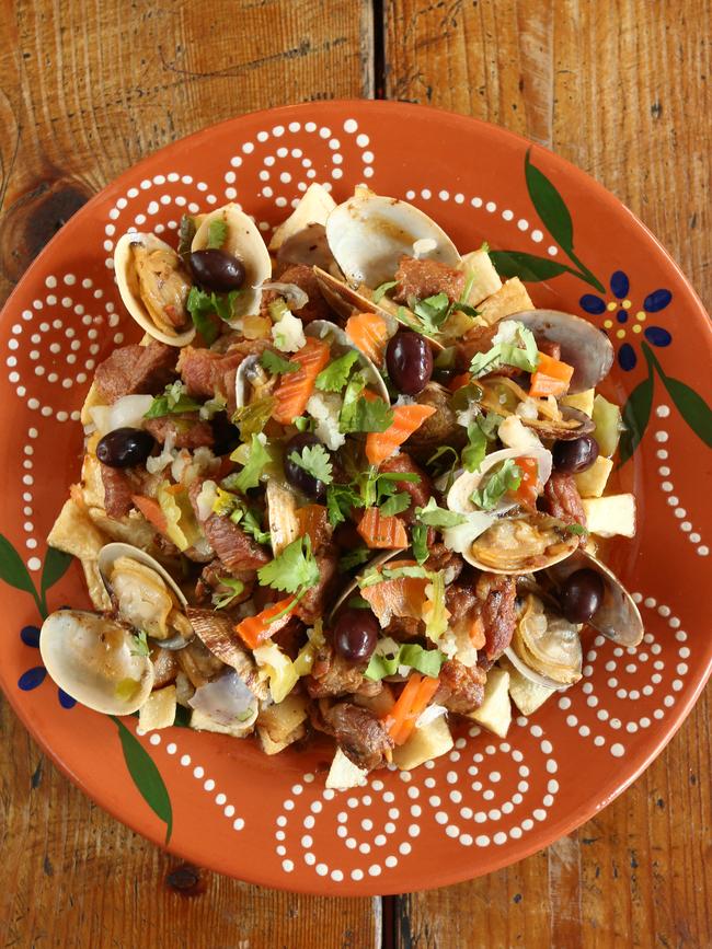 Gloria’s Cafe serves Alentejana: fried pork with clams, coriander and diced potatoes.