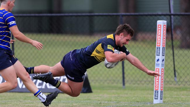 Marlon Jones scores in the corner earlier in the season. Picture: Scott Powick NEWSCORP